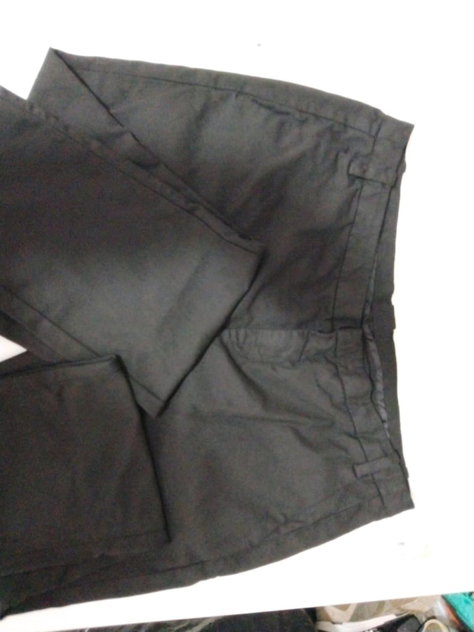Reparación y ajuste de pantalón — después de la reparación