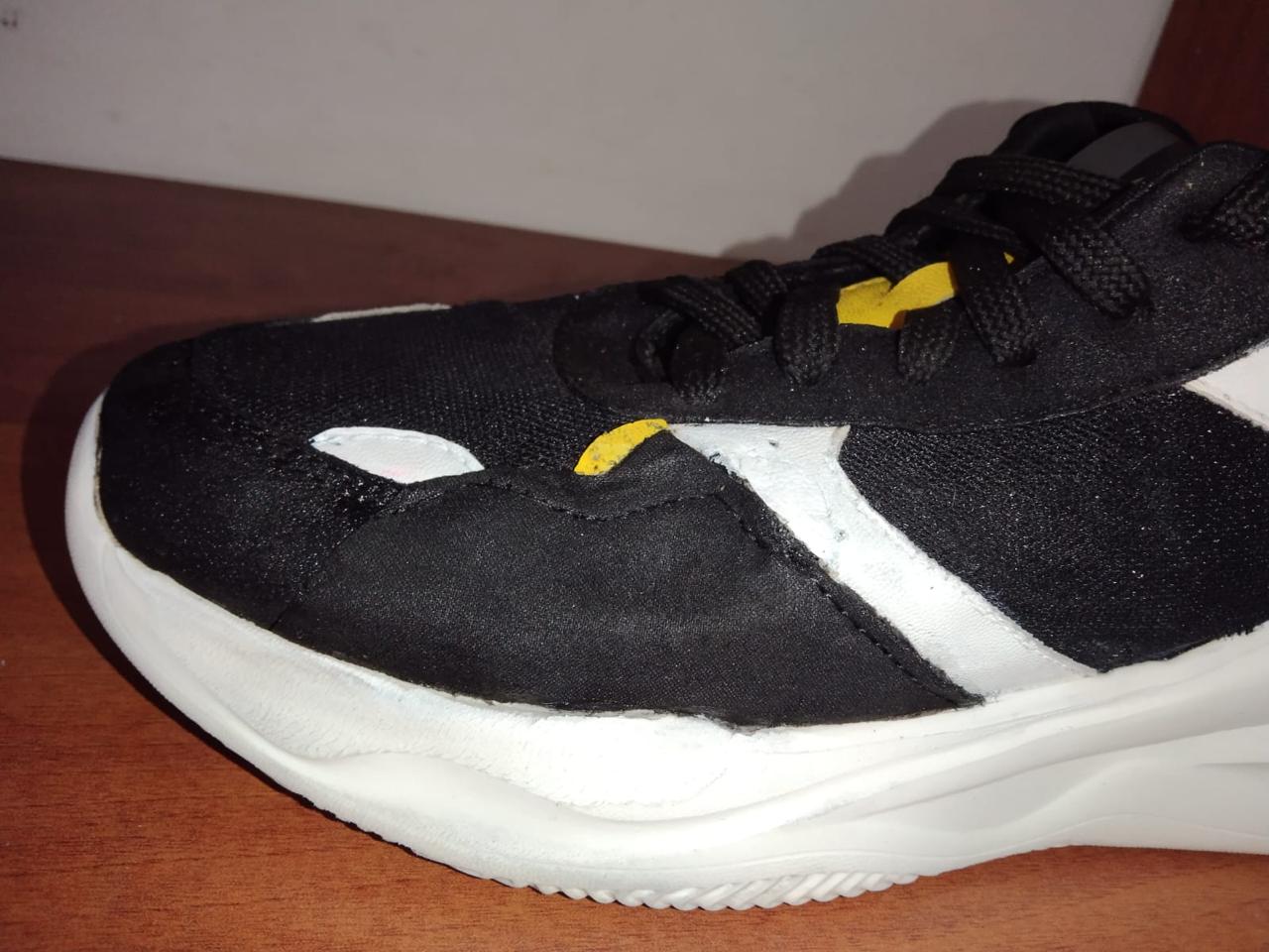 Reparación de capellada en tenis — después de la reparación